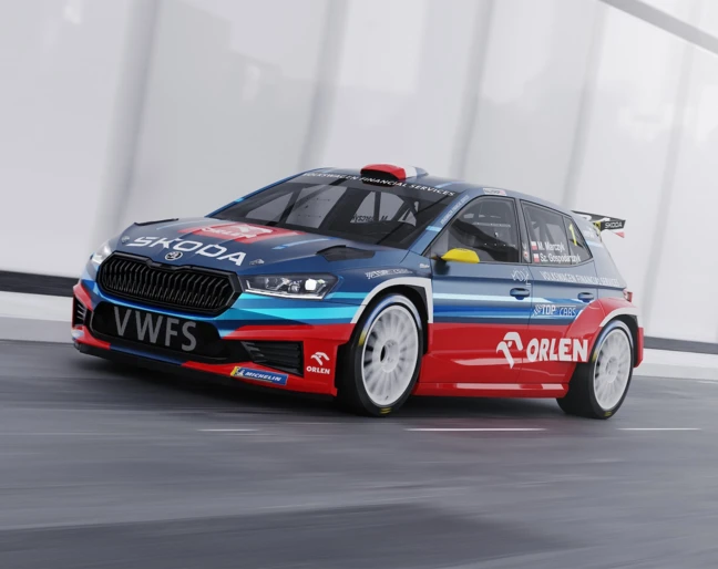 Miko Marczyk z samochodem Skoda Fabia